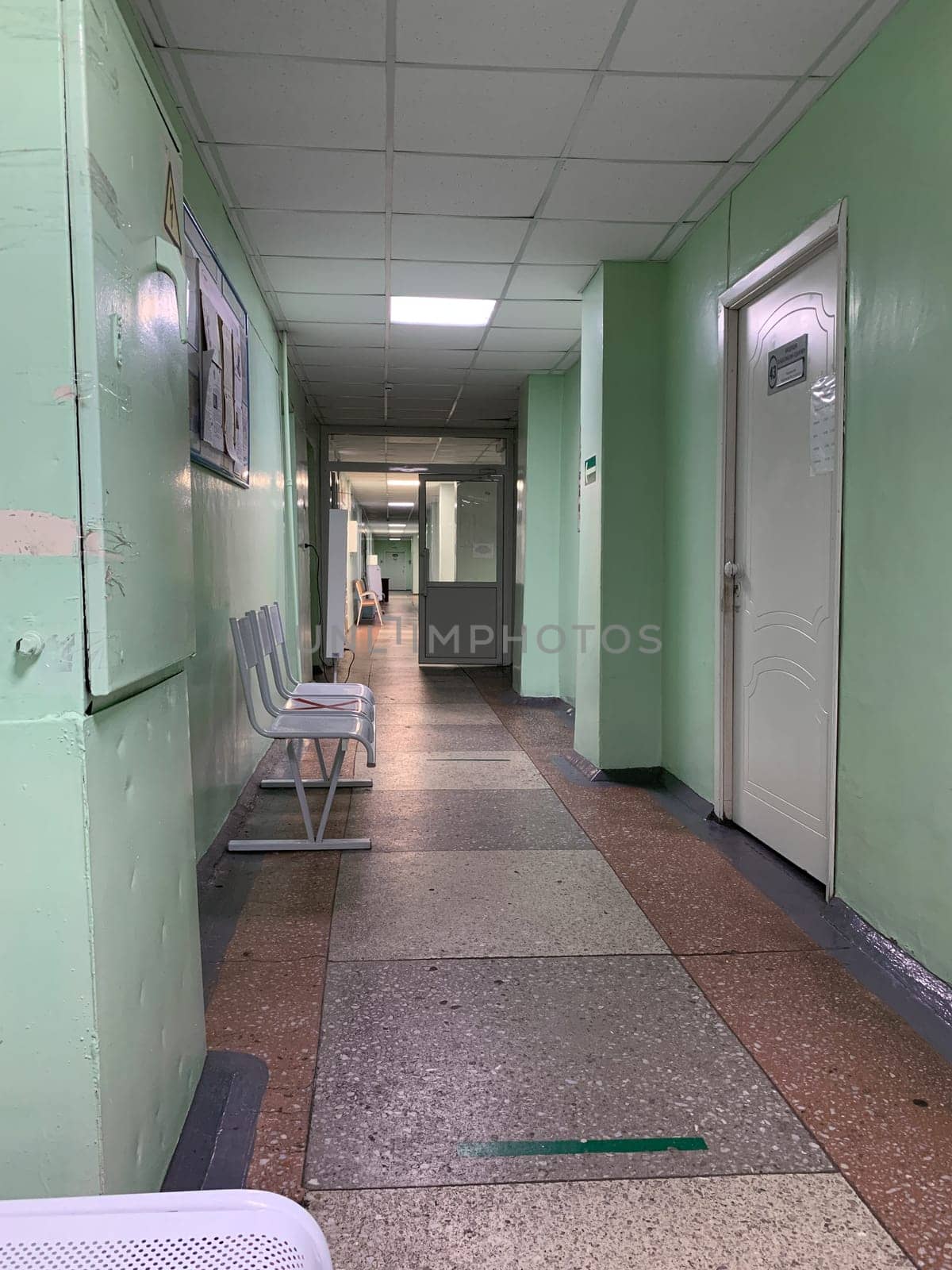 Empty corridor of an old hospital. hospital corridor with offices by AnatoliiFoto