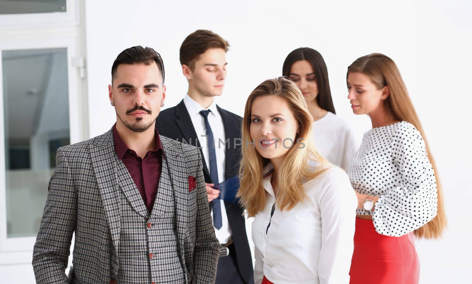 Group of smiling people stand in office looking in camera portrait. White collar power mediation solution project creative advisor participation profession train bank lawyer client visit concept