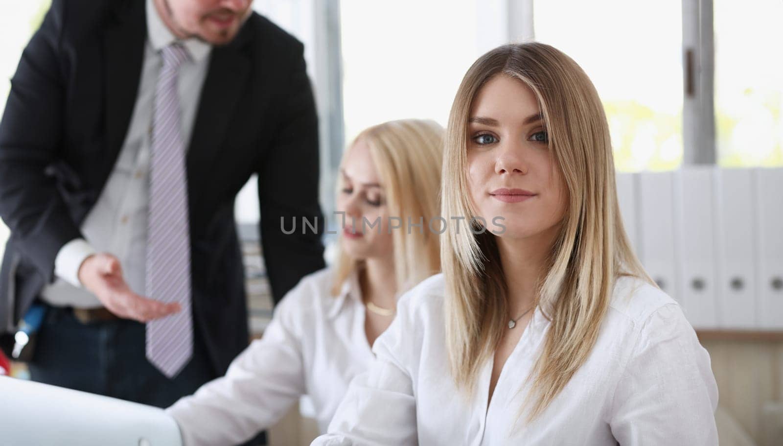 Beautiful smiling businesswoman portrait at workplace look in camera. White collar worker at workspace exchange market job offer irs certified public accountant internal revenue officer concept