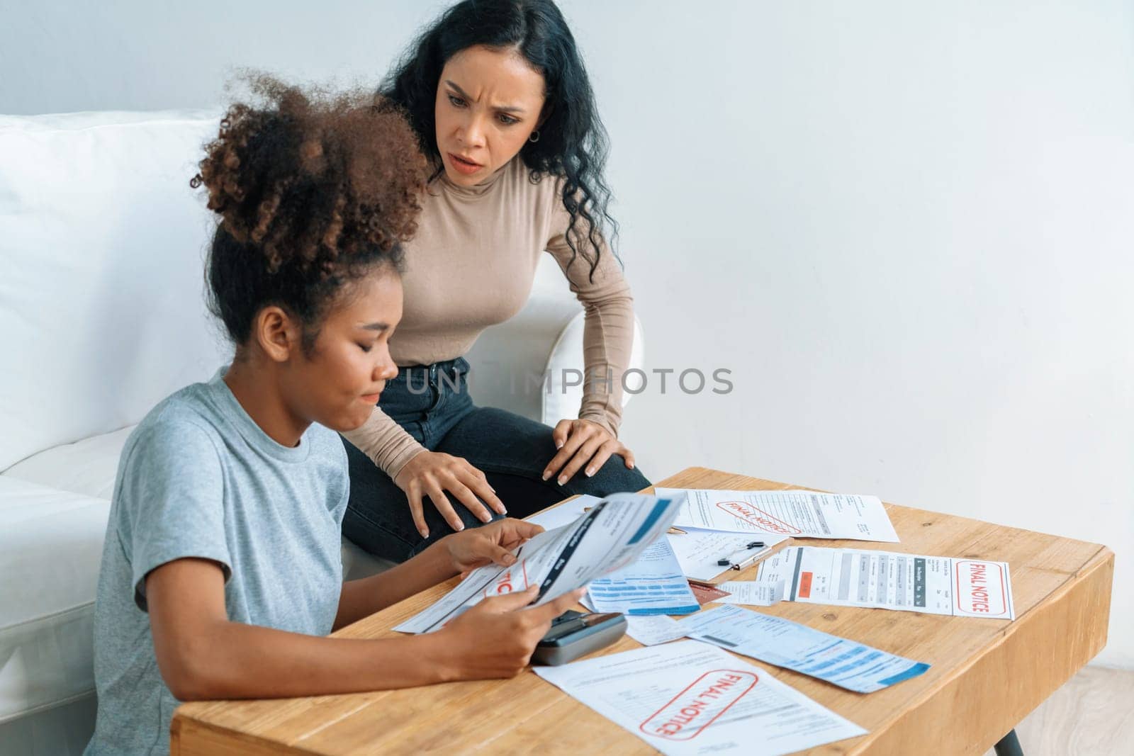 Stressed African American women has financial problems with credit card debt to pay crucial show concept of bad personal money and mortgage pay management crisis.