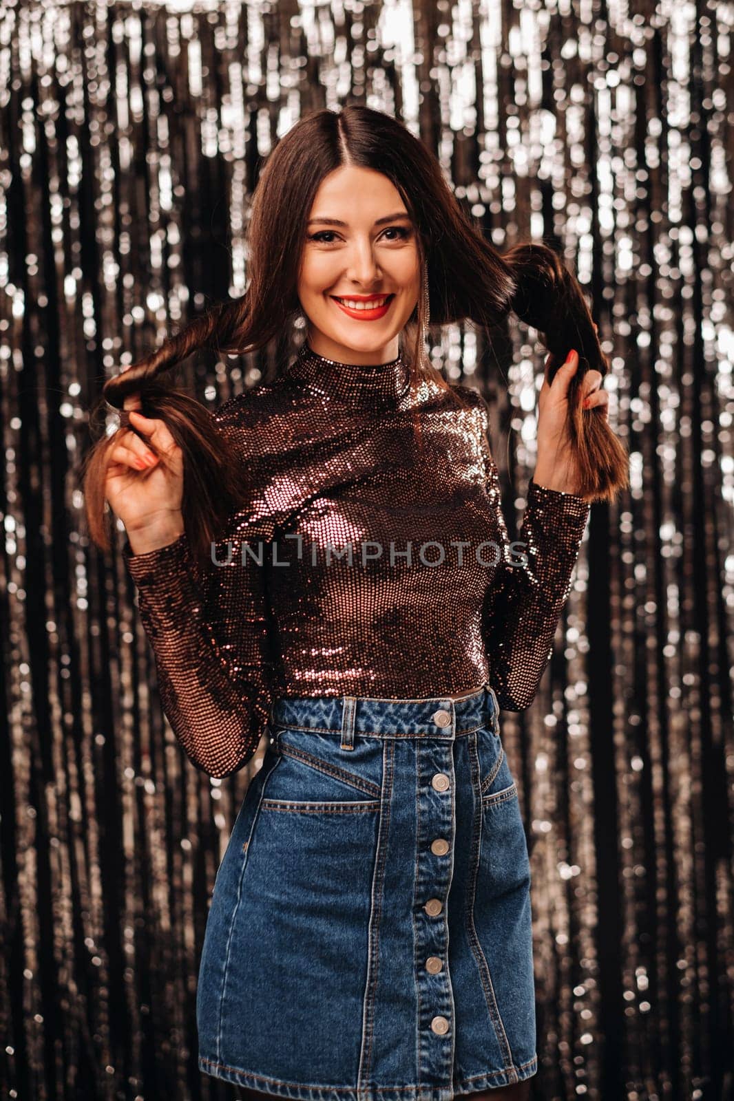 a girl in a shiny jacket on a silver background of New Year's rain by Lobachad