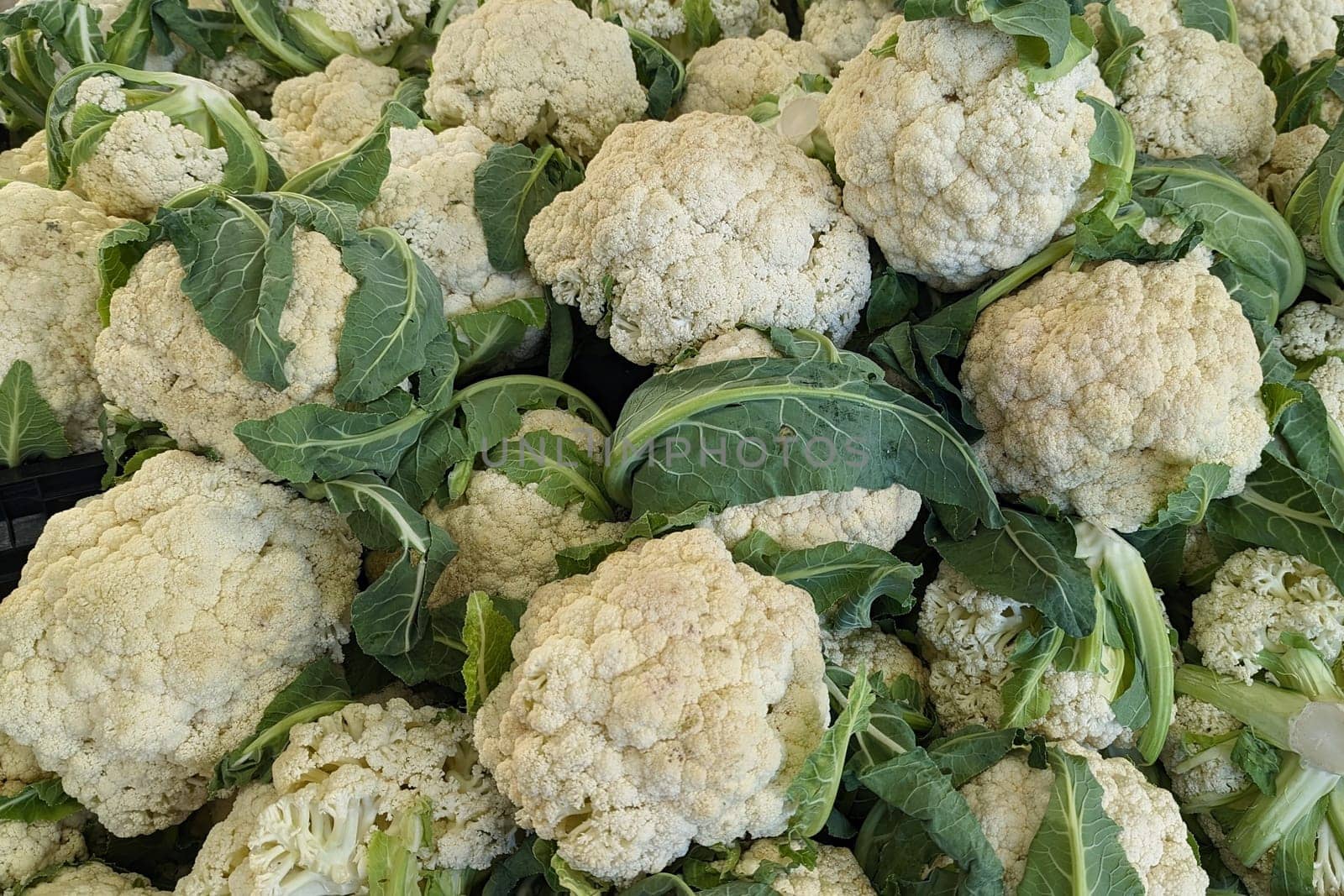 Fresh cauliflowers in the market. collection of healthy food