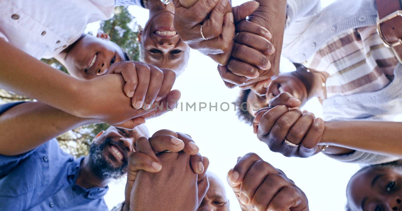 Holding hands, community support or family in nature for bonding or playing in a park together. Love, low angle or mother with grandparents, father or happy children with smile on holiday vacation.