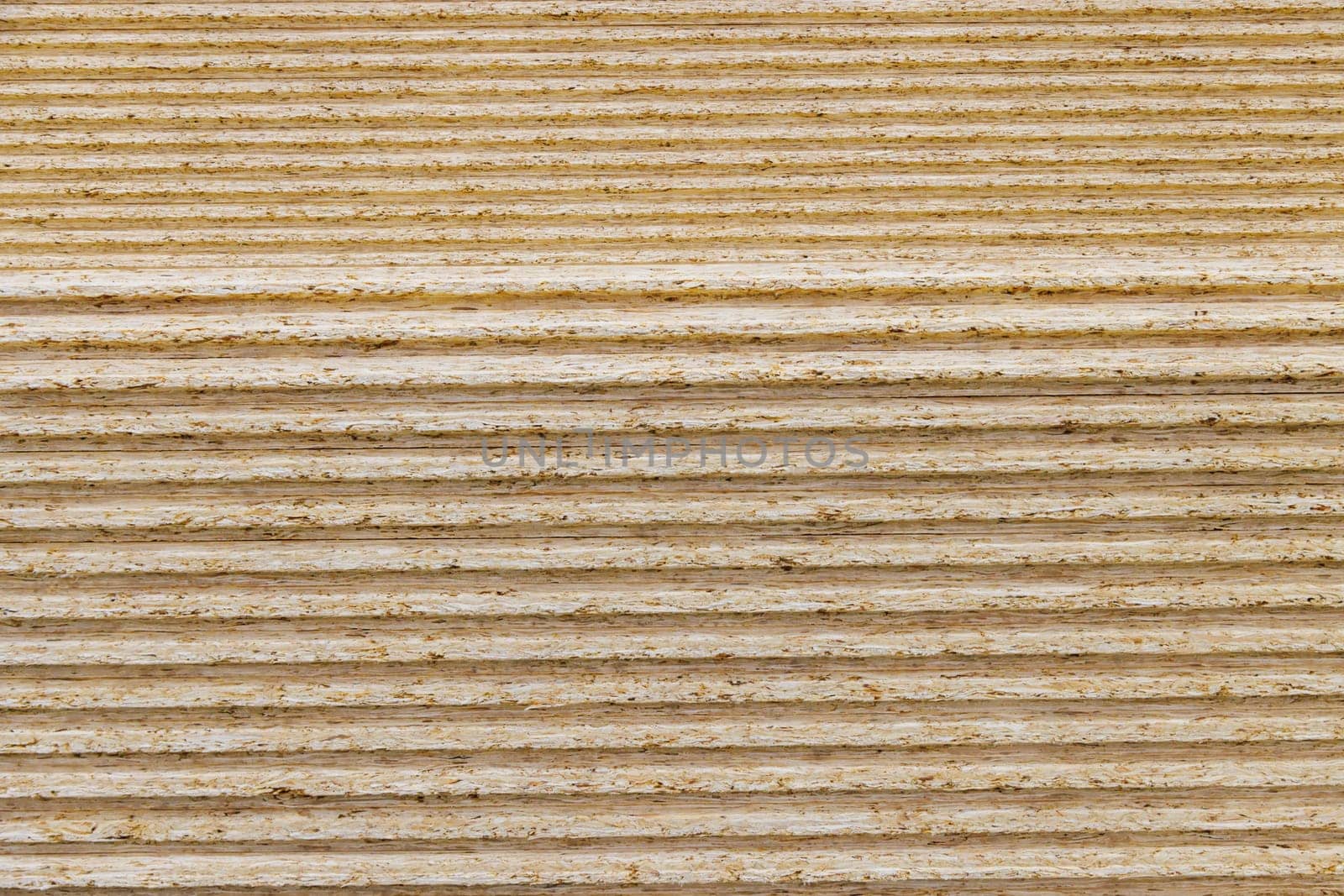 stacks of tongue and groove OSB compressed sawdust sheets by z1b