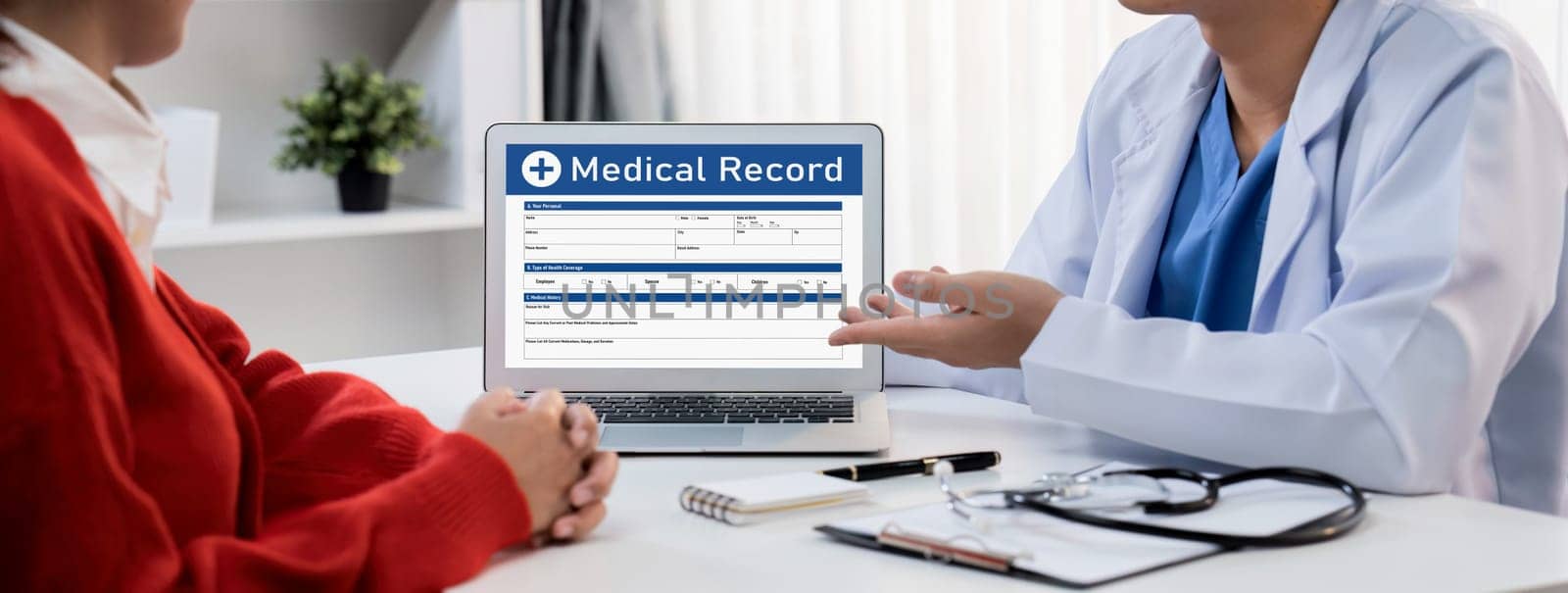 Laptop display medical report or diagnostic result of patient health on blurred background of doctor's appointment in hospital. Medical consultation and healthcare treatment. Panorama Rigid