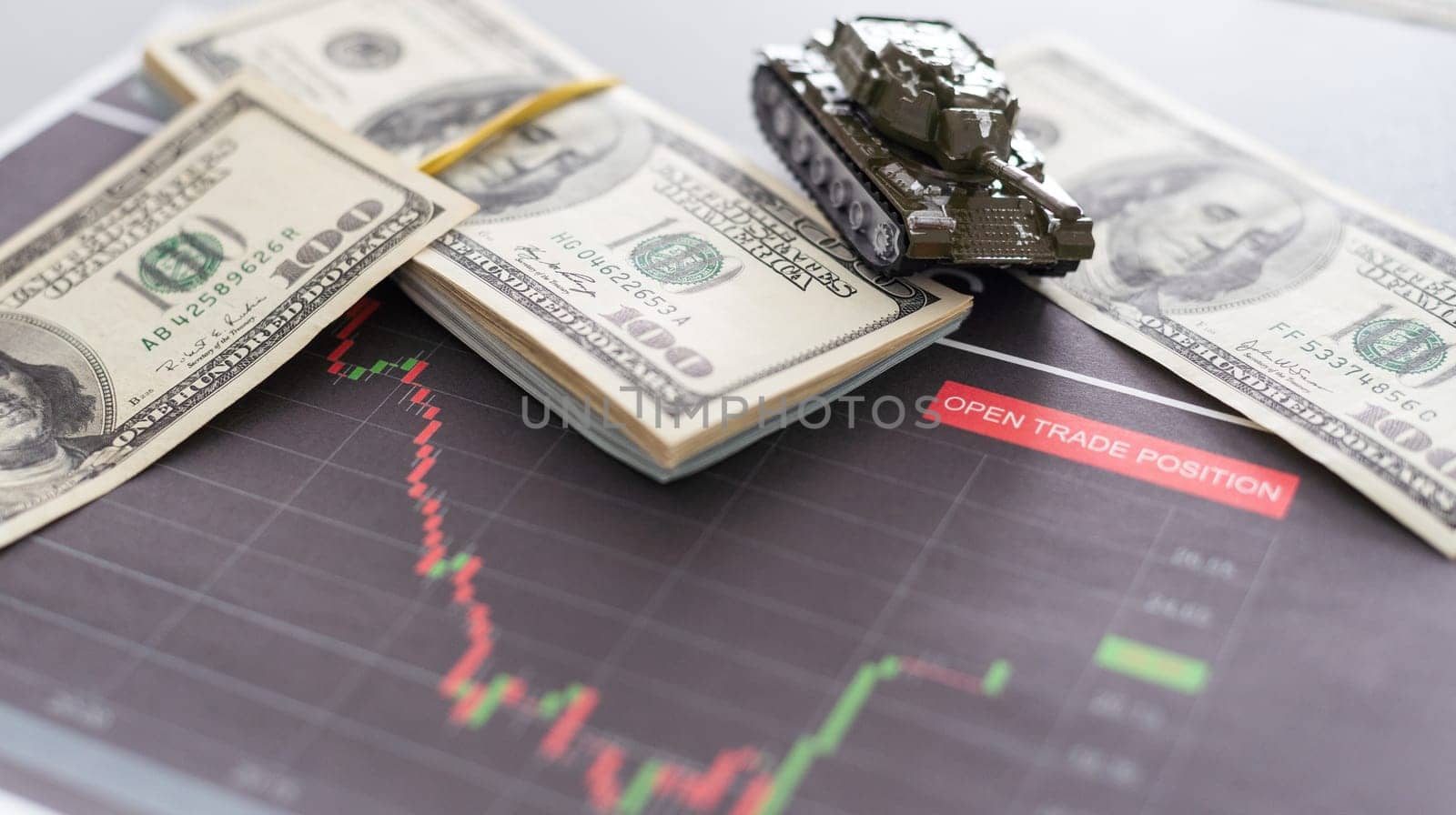 The main battle tank on US dollar bill banknotes background. U.S.A. and China trade war and currency war concept. U.S. fights against terrorism or sells arms weapons to other countries concept. High quality photo