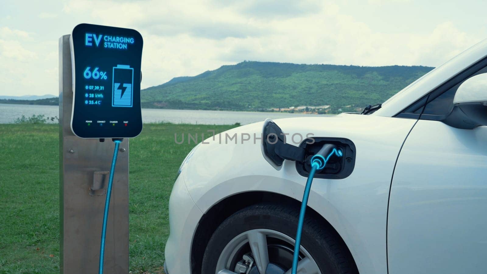 Electric car plugged in with charging station to recharge battery by EV charger cable with nature and lake background. Future innovative ev car and energy sustainability. Peruse