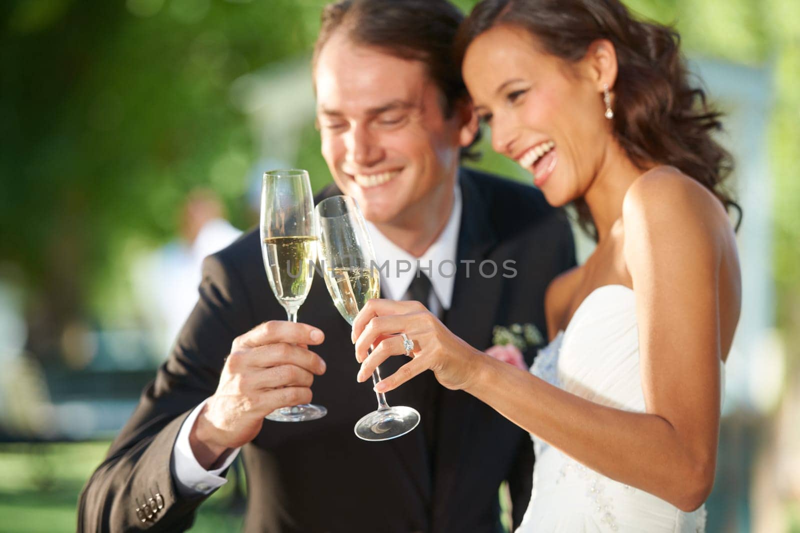 Outdoor, champagne and bride with groom, hug and support with relationship, romance and celebration. Romantic, outside or man with woman, marriage or happiness with love, cheers or wedding with smile.