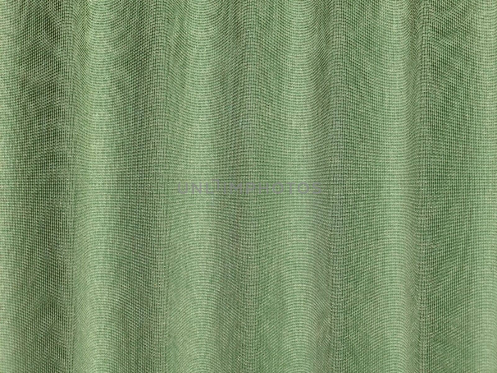 Background with green ondulin. Modern cheap roofing material, top view.