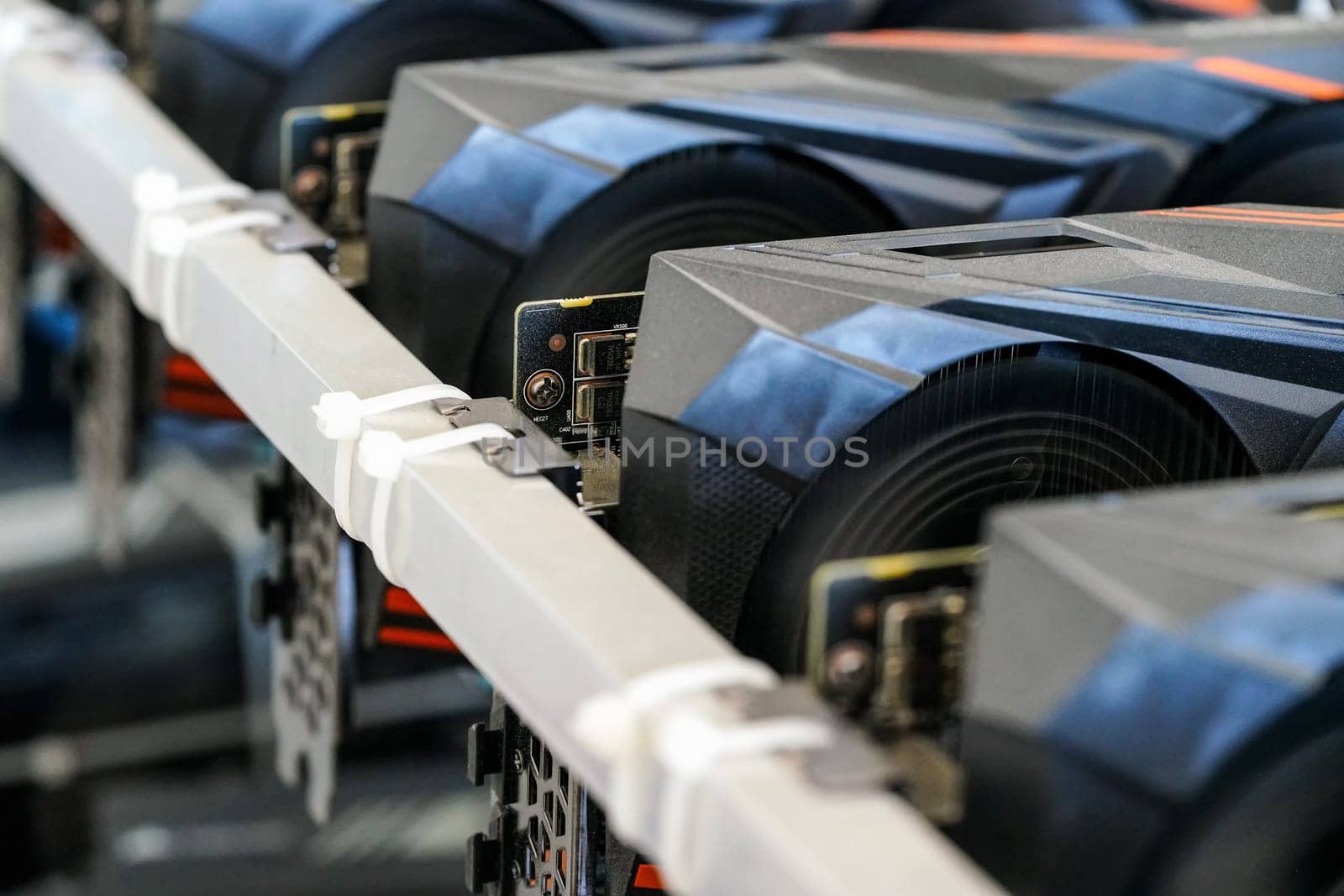 Closeup photo of graphics video card on ethereum cryptocurrency mining rig.