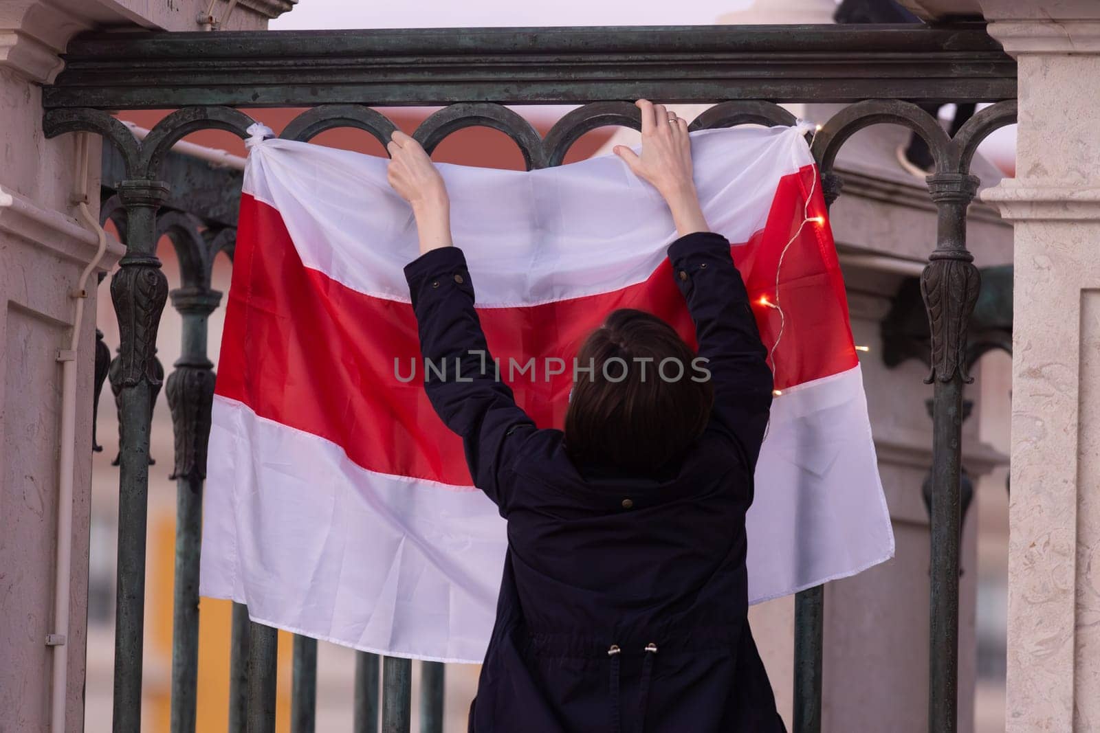 Woman with white red white flag of Belarus resistance - visit of opposition in Lisbon by Studia72