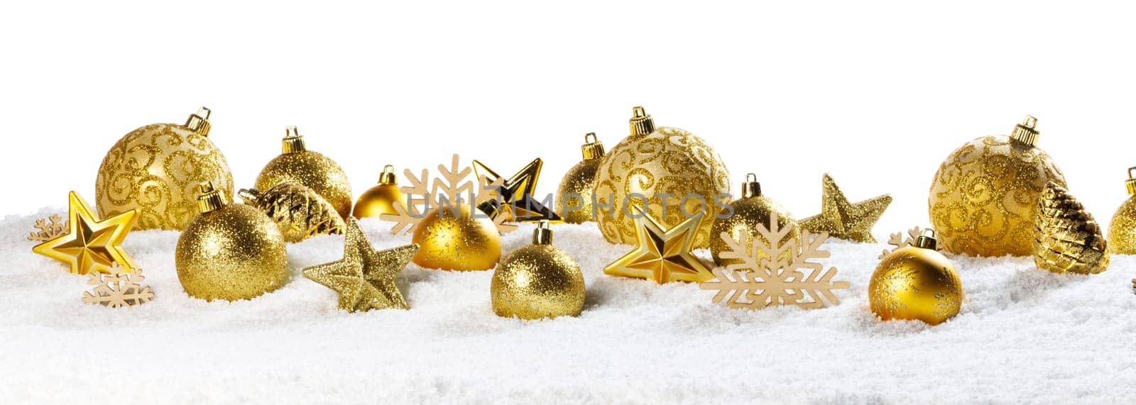 Christmas border with golden ornaments on snow isolated on white background