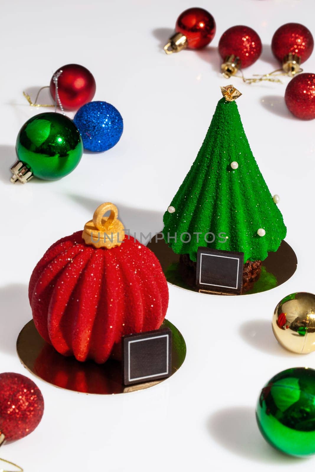 Pastries in shape of Christmas tree and red ball by nazarovsergey