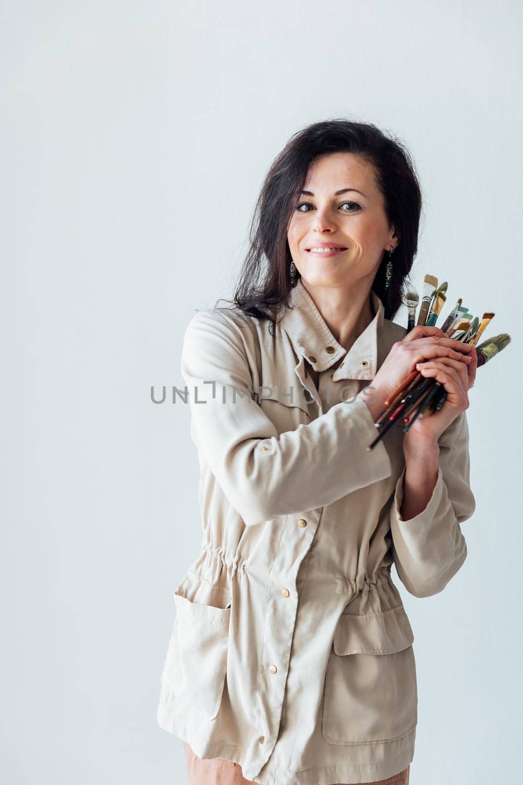 a woman with brushes for drawing artist