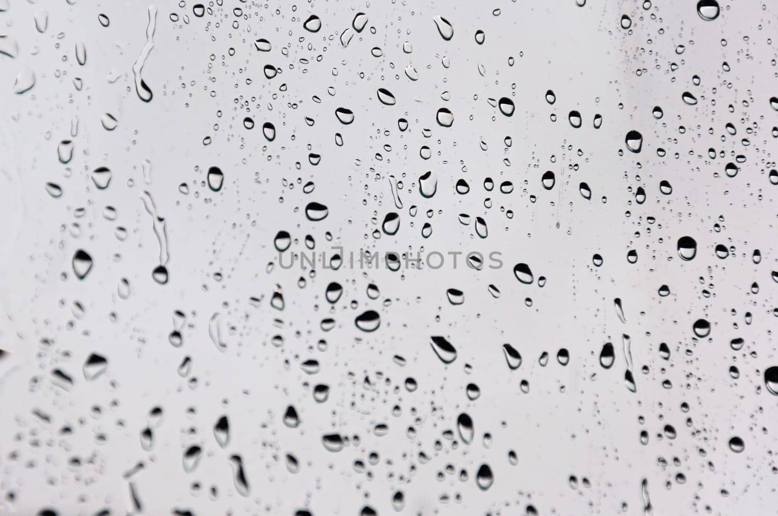 Rain drops on the glass, background there is a place for an inscription by PopOff