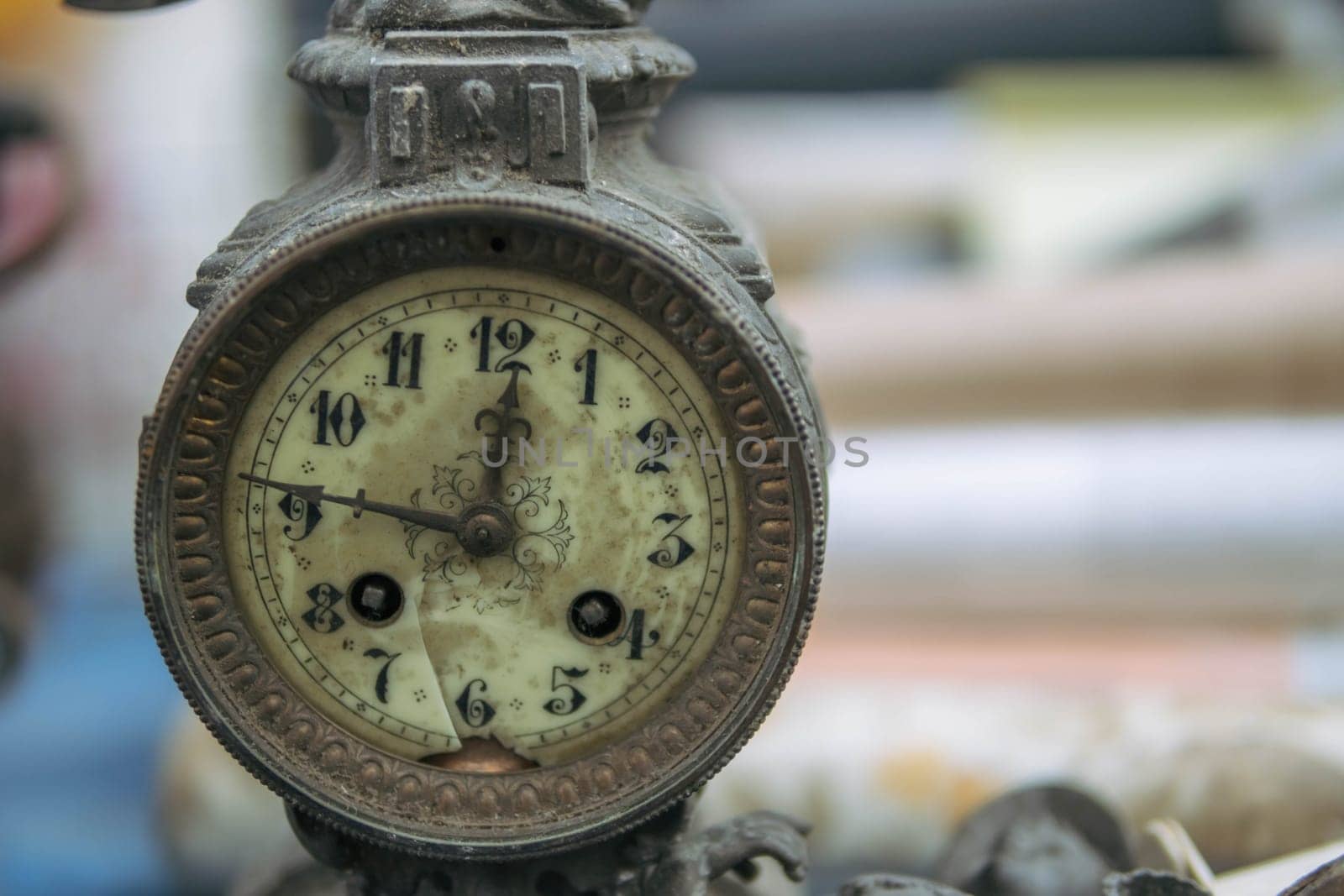 they sell antique watches at the fair. there is a place for an inscription on the side, the clock is close-up. High quality photo