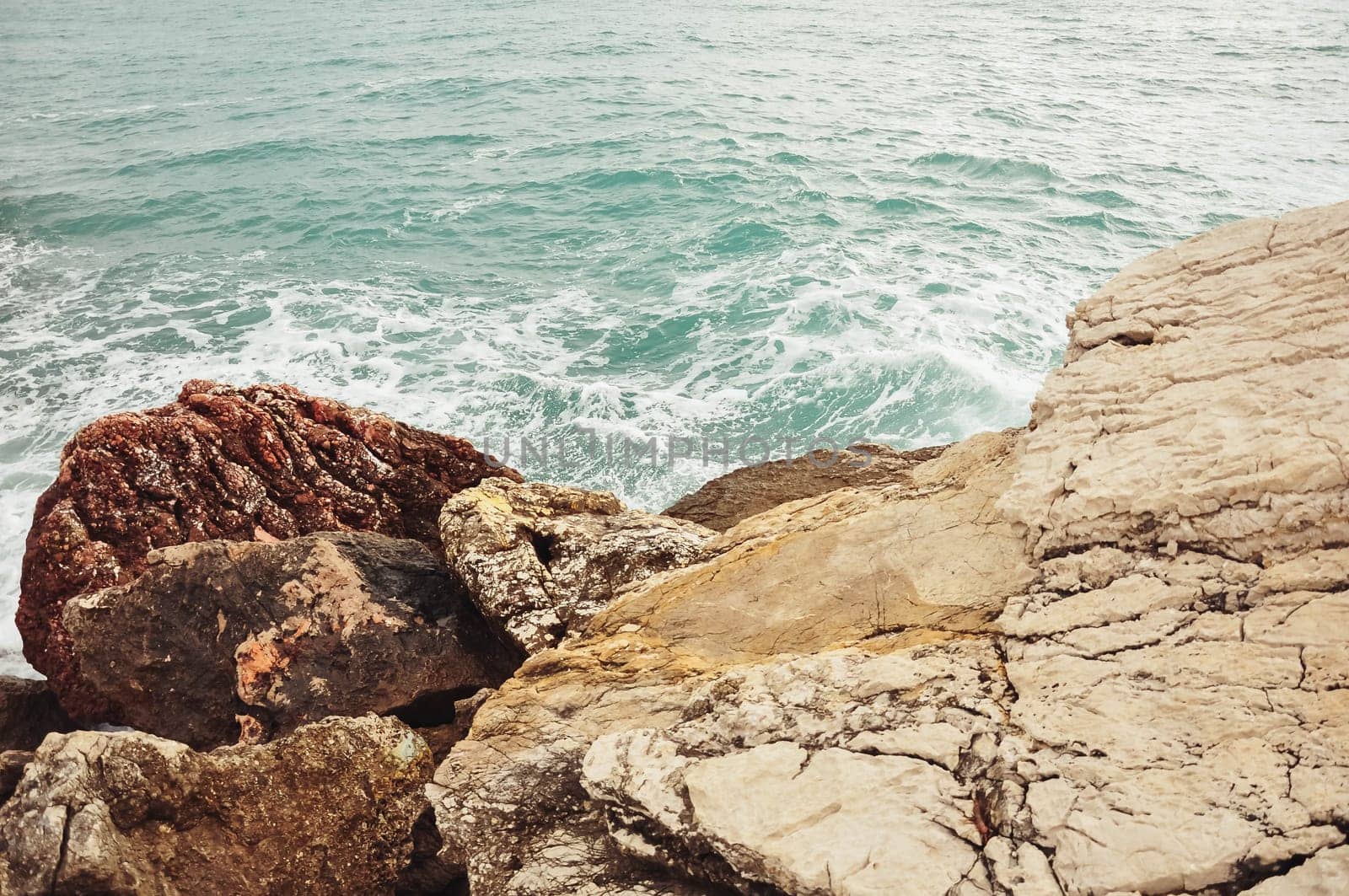 top view of the rock and the sea, a beautiful landscape and background, there is a place for inscriptions. High quality photo