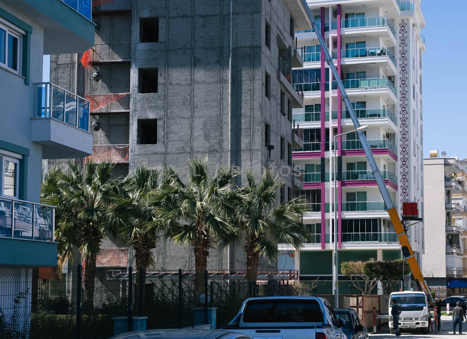 multi-storey building complex. Motion. View of the beautiful design of the facade of a multi-storey residential building.Renovation of the complex. High quality photo