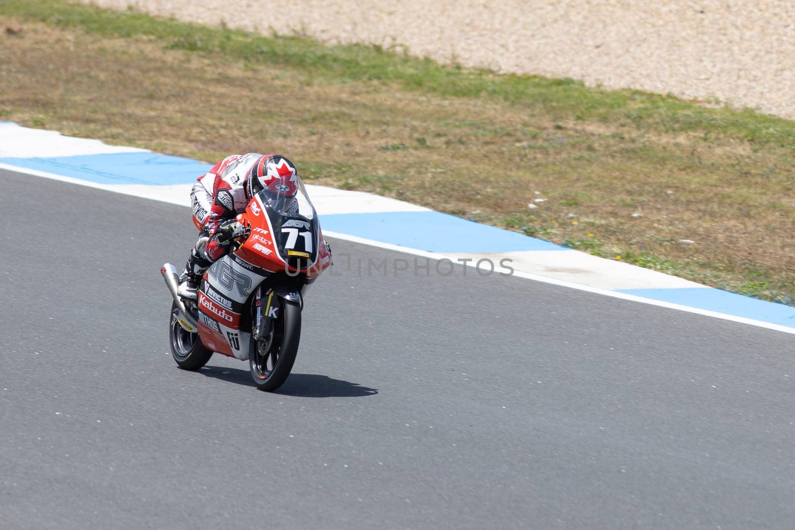 6 may 2023, Estoril, Portugal - MotoGP racing - A person riding a motorcycle on a race track