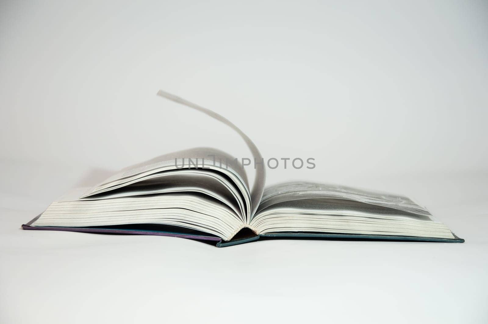 open book on white background by PopOff