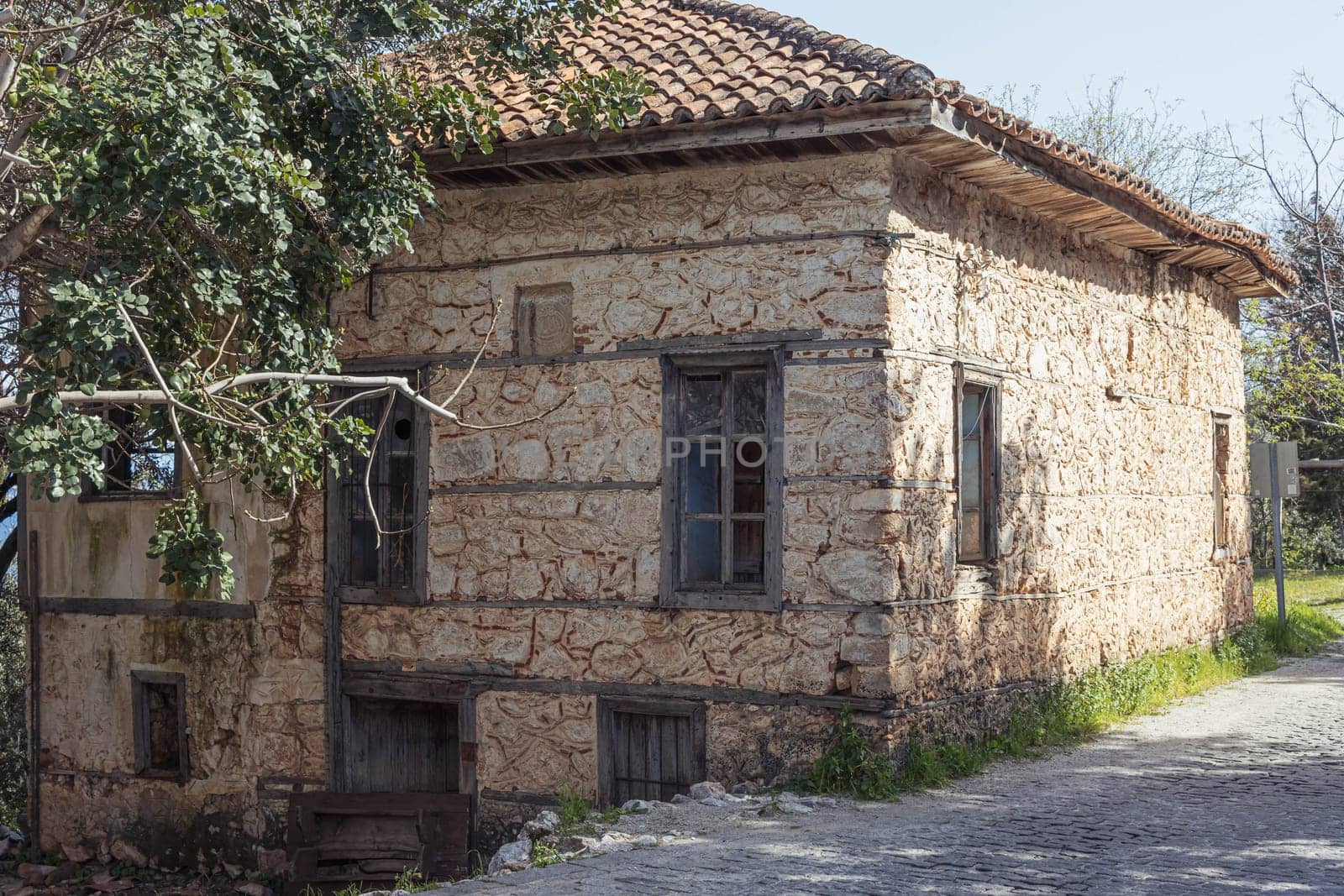 old brick house on the road to the park in the village. High quality photo