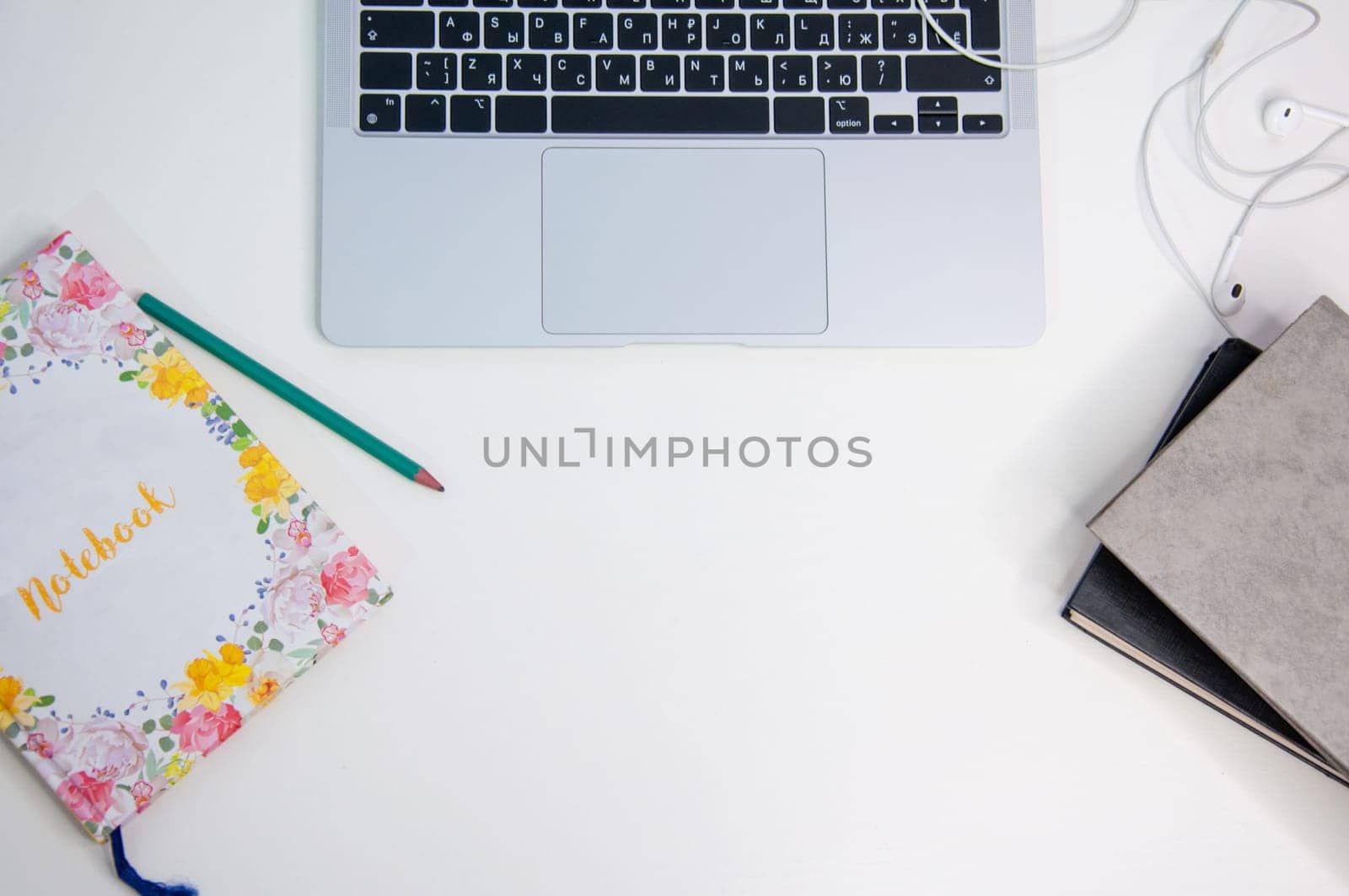 The workspace of an office or home is modern for online work or communication technologies in a store or at home indoors. view from above by PopOff