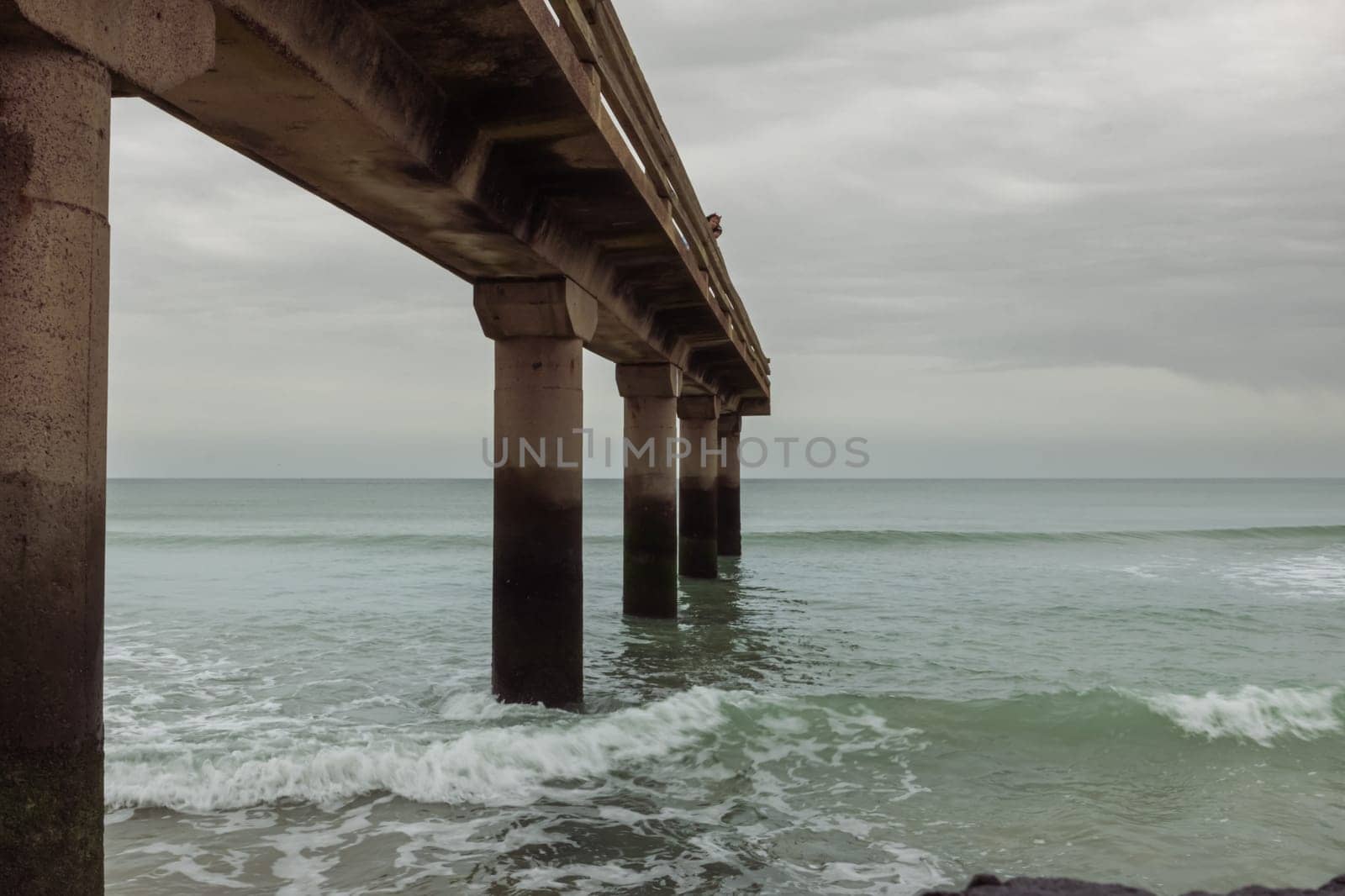 close-up view from the bottom of the bridge, from the water. Beautiful view of the ocean by PopOff