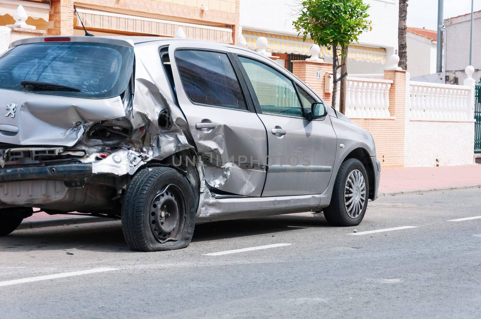 car crash accident on street, damaged automobiles after collision in city. High quality photo