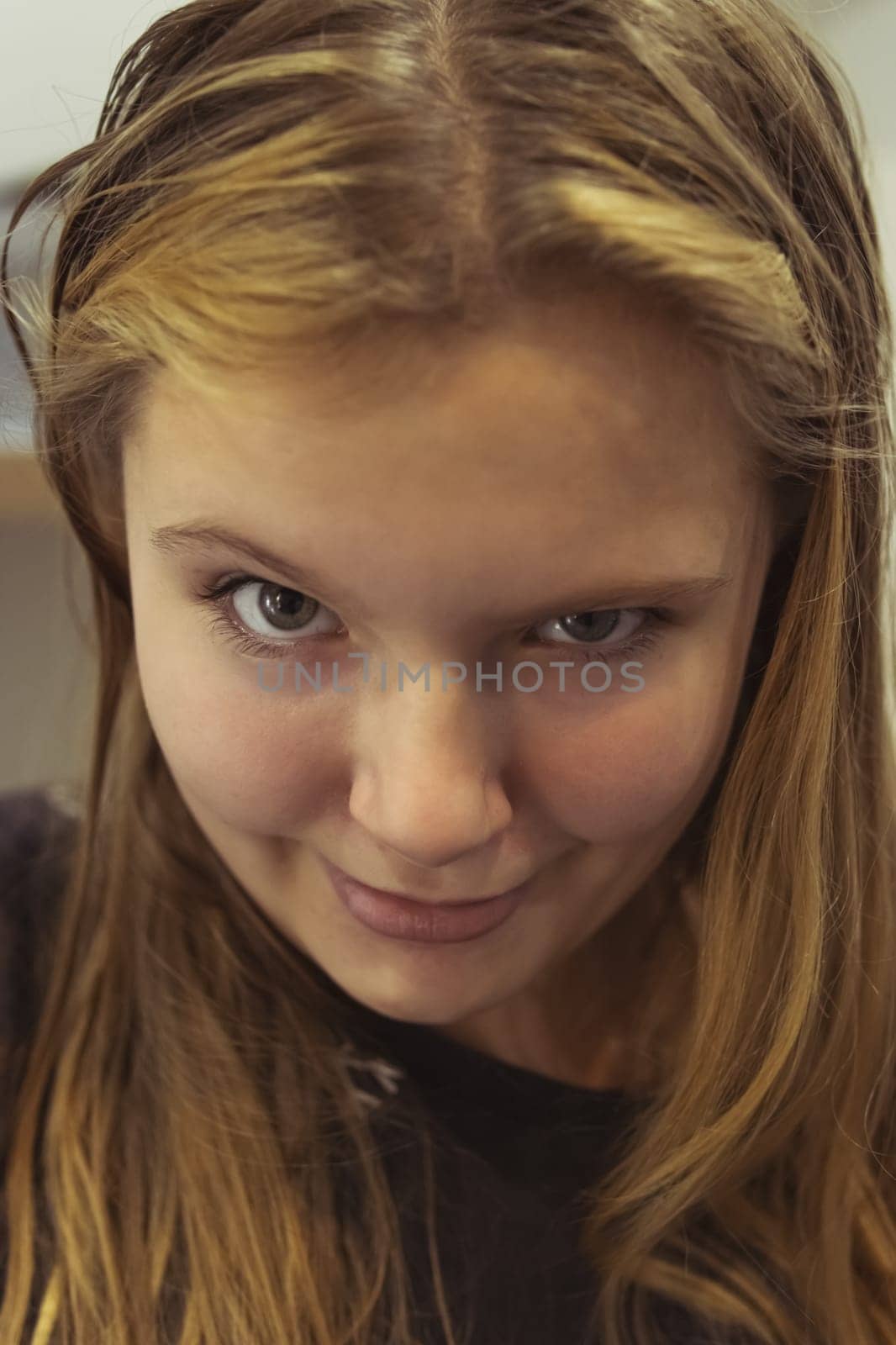 portrait of a teenage girl of European appearance with blond hair, close-up face, the child makes different emotions by PopOff