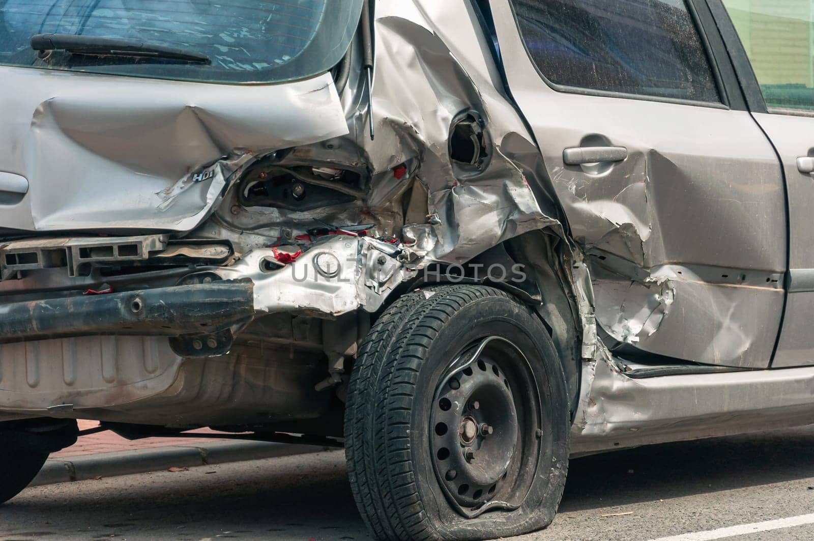 car after an accident, the insurance for the car damaged in the accident.The front bumper of the car all damaged after the accident by PopOff