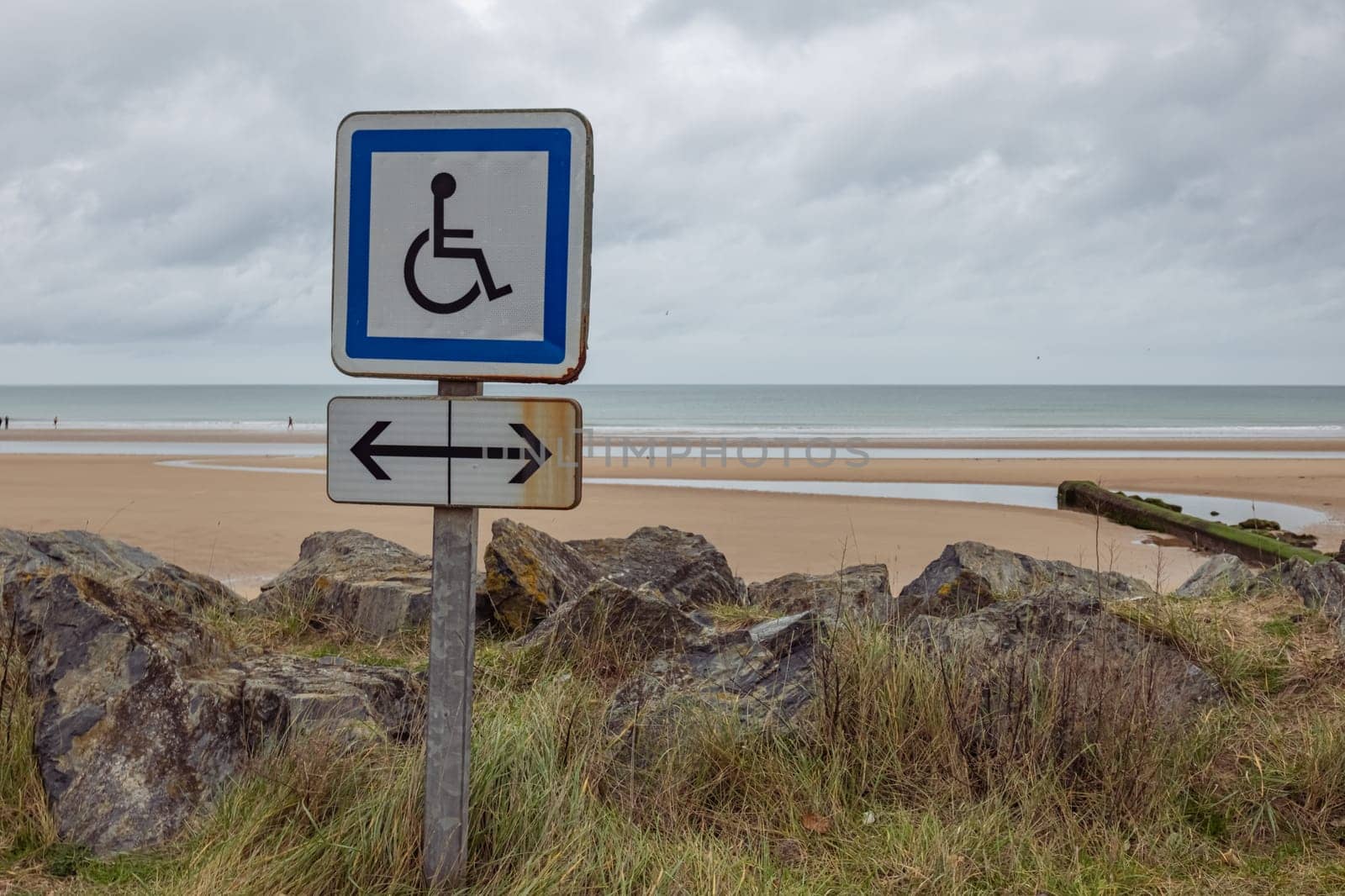 Disability sign on the sea beach sign for people with disabilities by PopOff