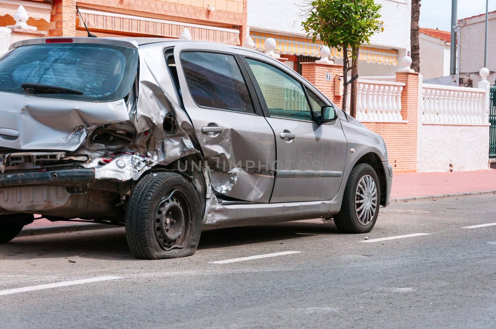 car after an accident, the insurance for the car damaged in the accident.The front bumper of the car all damaged after the accident by PopOff