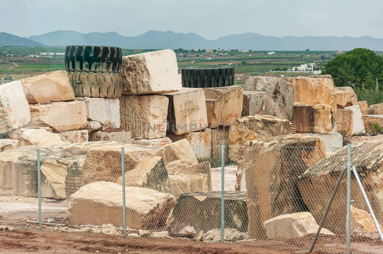 marble quarry plant, close-up on marble. there is a place for an inscription High quality photo by PopOff