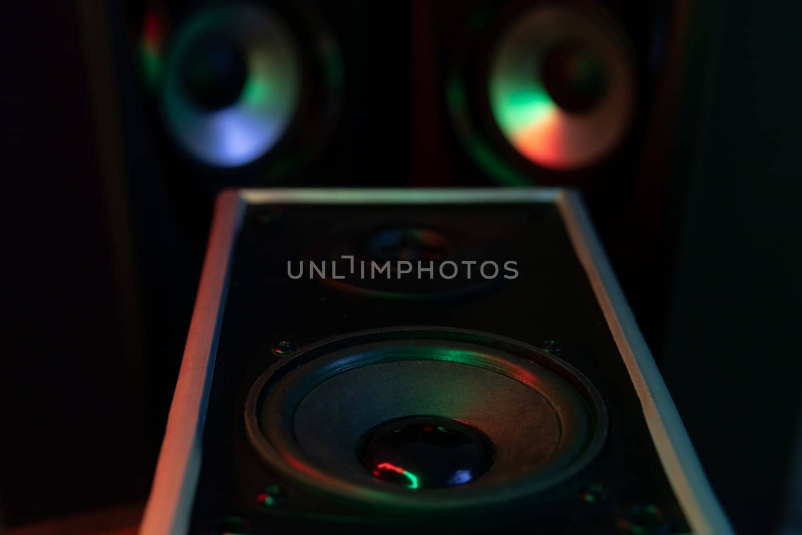 powerful sound speakers in colorful neon light.Powerful music. High quality photo