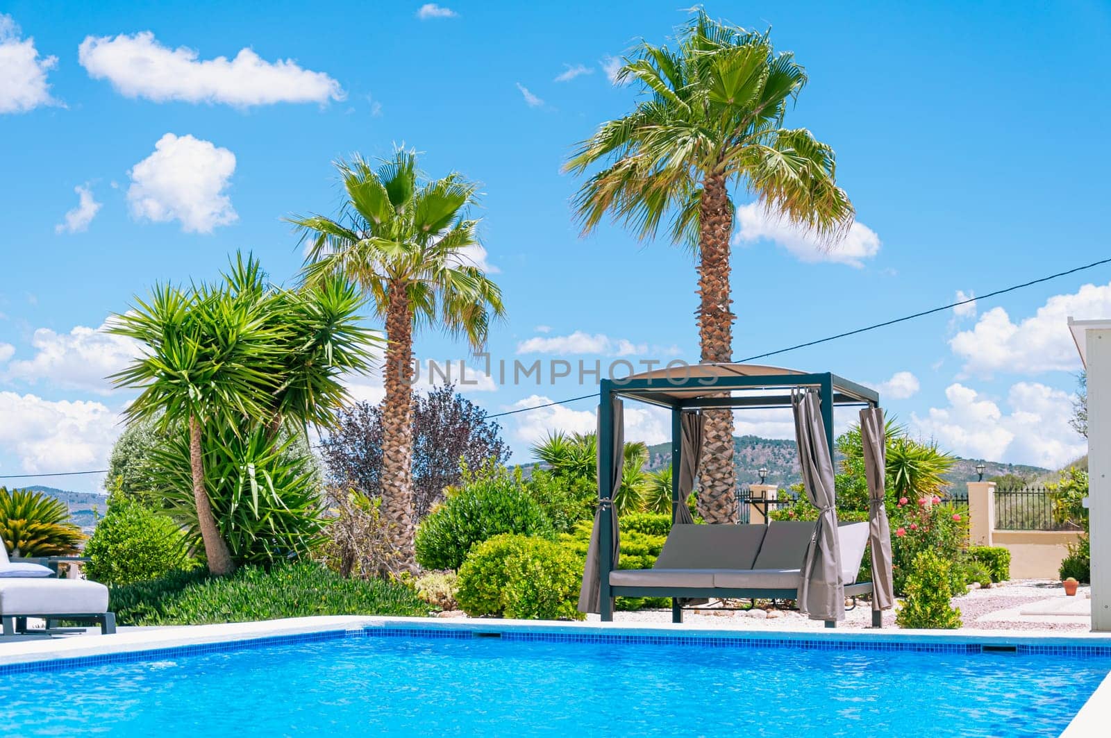 landscape swimming pool blue sky with clouds. Tropical beautiful hotel. High quality photo