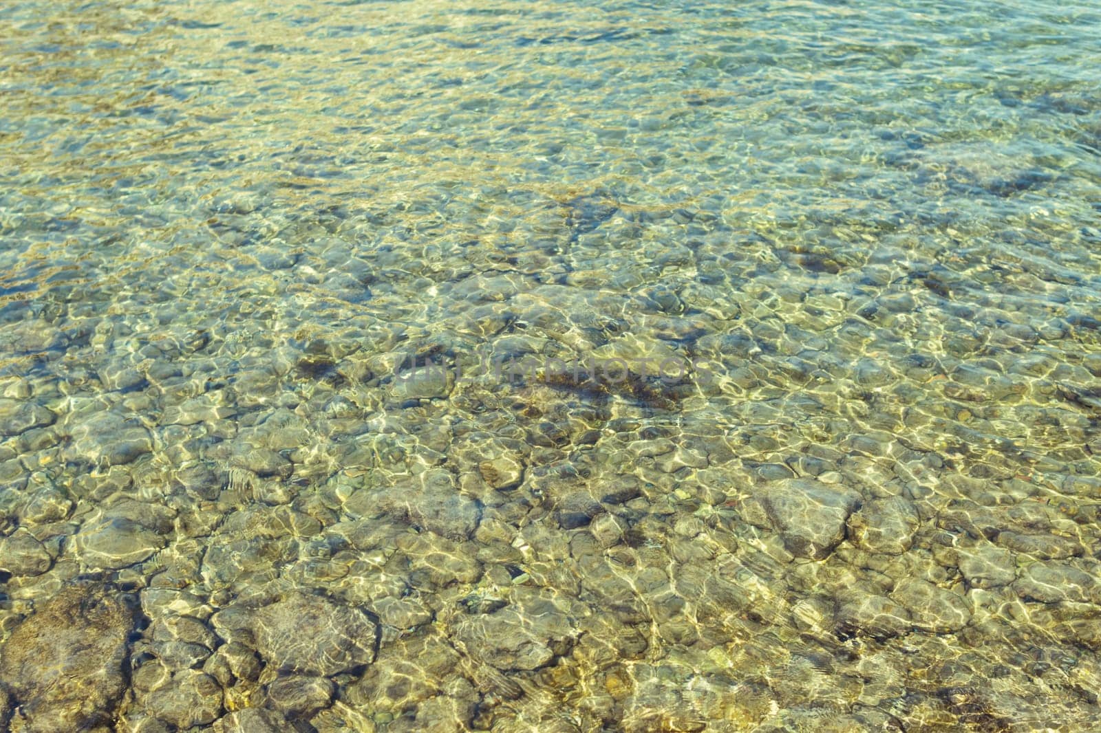 close-up sea with a rocky sunset, there is a place for an inscription, a beautiful seascape by PopOff