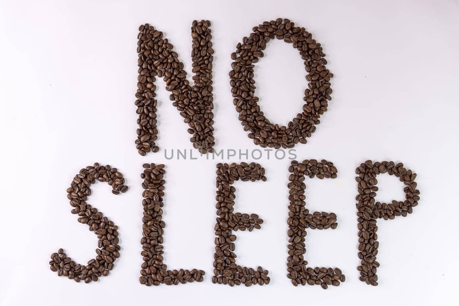 On a white background with coffee beans written No sleep by PopOff