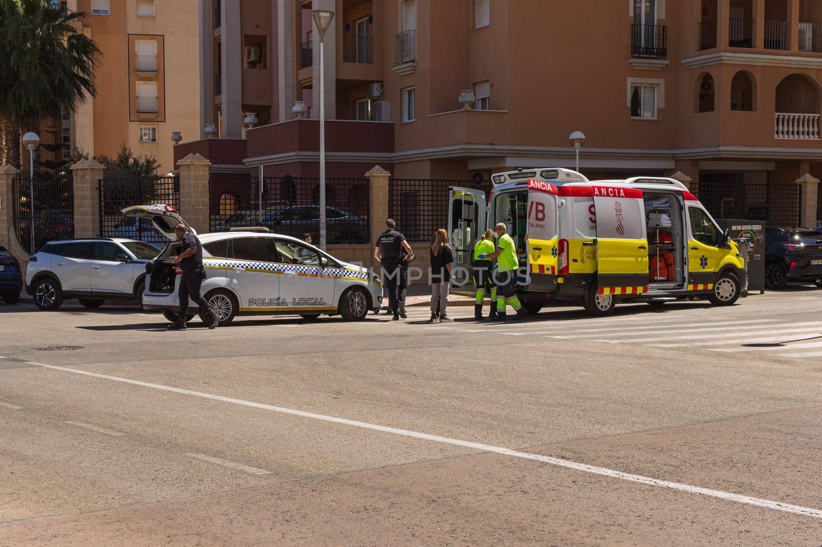 Accident in Spain, Torrevieja May 28, 2023, police car and ambulance on the road by PopOff