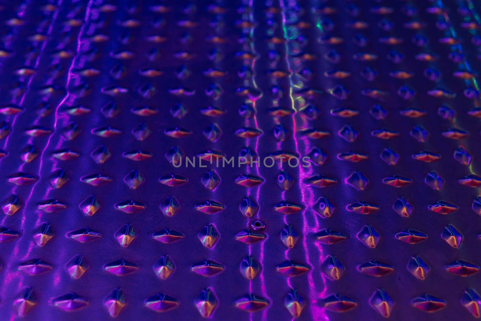 Abstract shiny purple texture surface background close up view by PopOff