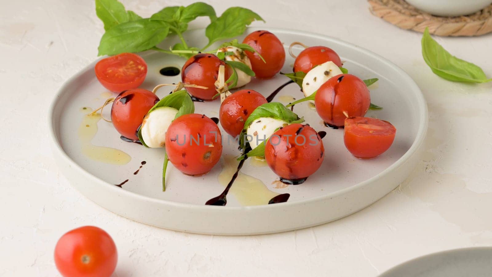 Caprese salad with tomato and mozzarella by homydesign