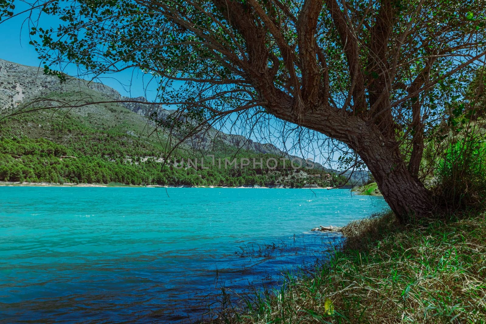 Mountain landscape, picturesque mountain lake on a summer morning, large panorama, Spain, Guadalest. High quality photo