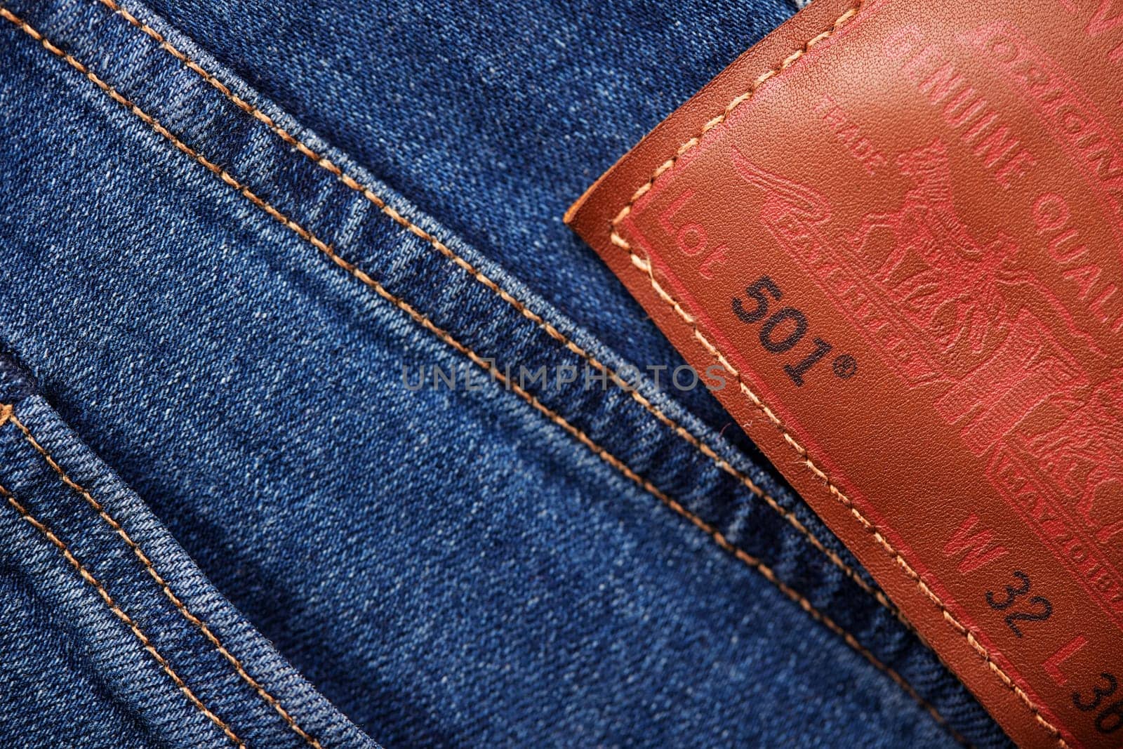 Close up of the details of new LEVI'S 501 Jeans. label and patch LEVI'S. Classic jeans model. LEVI'S is a brand name of Levi Strauss and Co, founded in 1853. 31.12.2021, Rostov, Russia.
