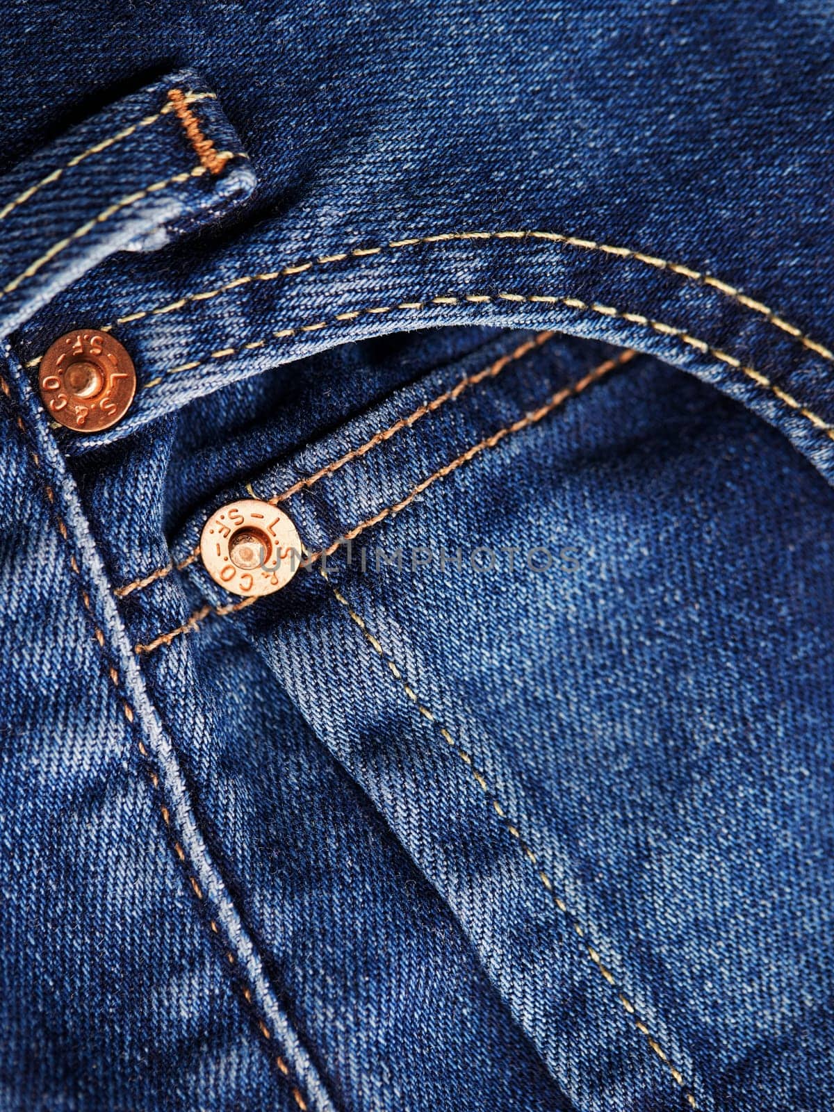 Close up of details of new LEVI'S 501 Jeans. Buttons and seams and pockets close-up. Classic jeans model. LEVI'S is a brand name of Levi Strauss and Co, founded in 1853. 31.12.2021, Rostov, Russia by EvgeniyQW