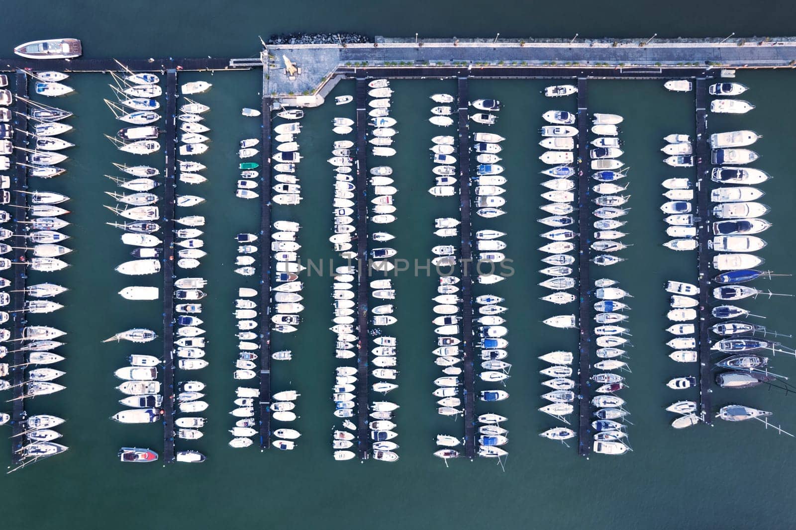 Aerial view of a port area for tourist boating  by fotografiche.eu