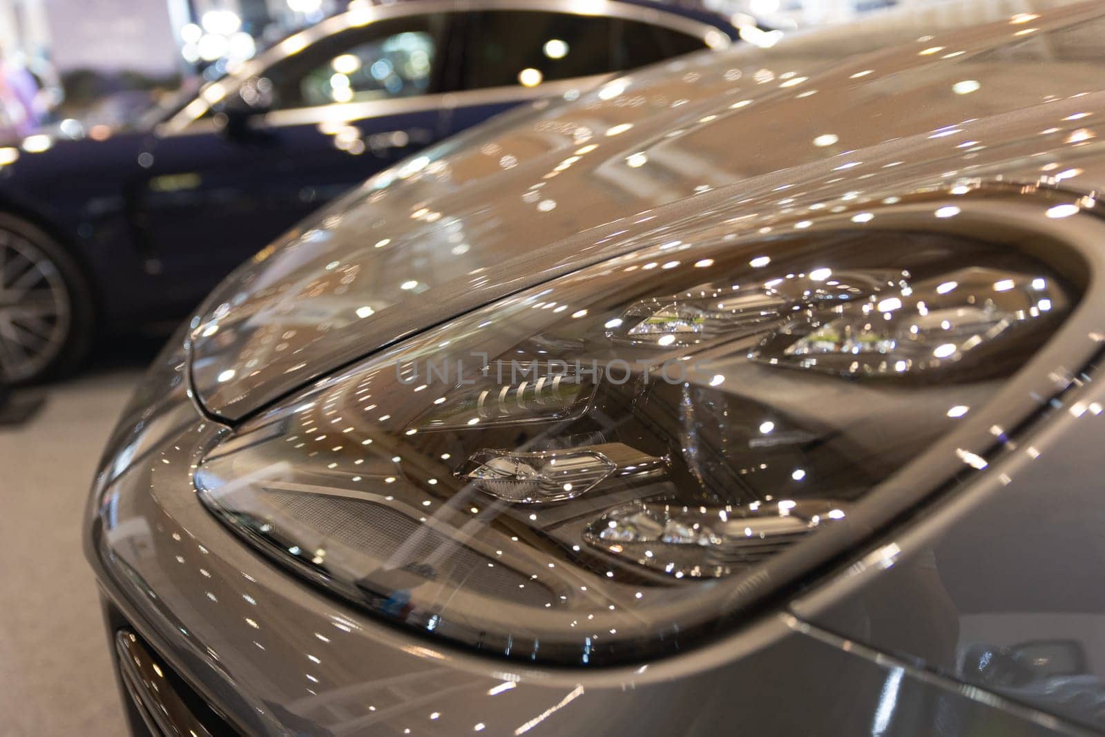 A close up of a car on a showroom floor