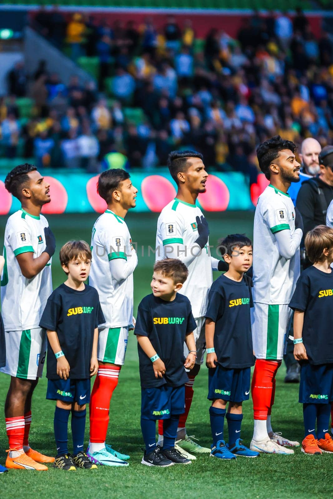 MELBOURNE, AUSTRALIA - NOVEMBER 16: National anthem atmosphere before the 2026 FIFA World Cup Qualifier match between Australia Socceroos and Bangladesh at AAMI Park on November 16, 2023 in Melbourne, Australia