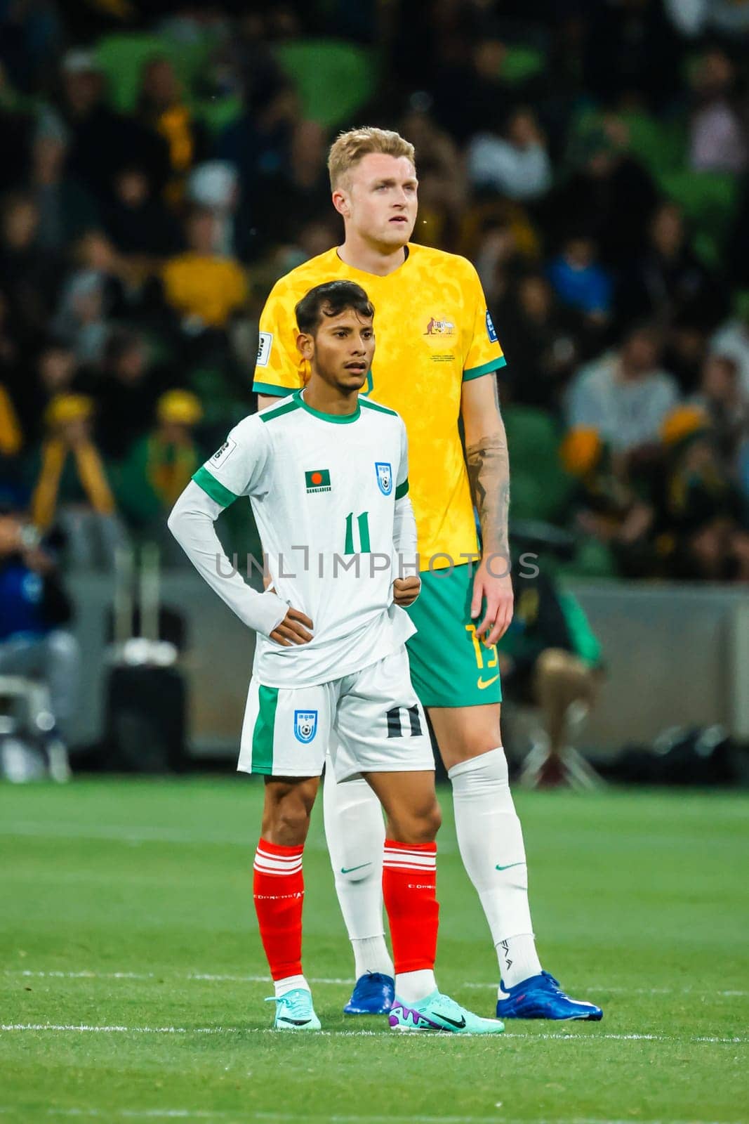 MELBOURNE, AUSTRALIA - NOVEMBER 16: Harry Souttar of Australia and Foysal Fahim of Bangladesh during the 2026 FIFA World Cup Qualifier match between Australia Socceroos and Bangladesh at AAMI Park on November 16, 2023 in Melbourne, Australia