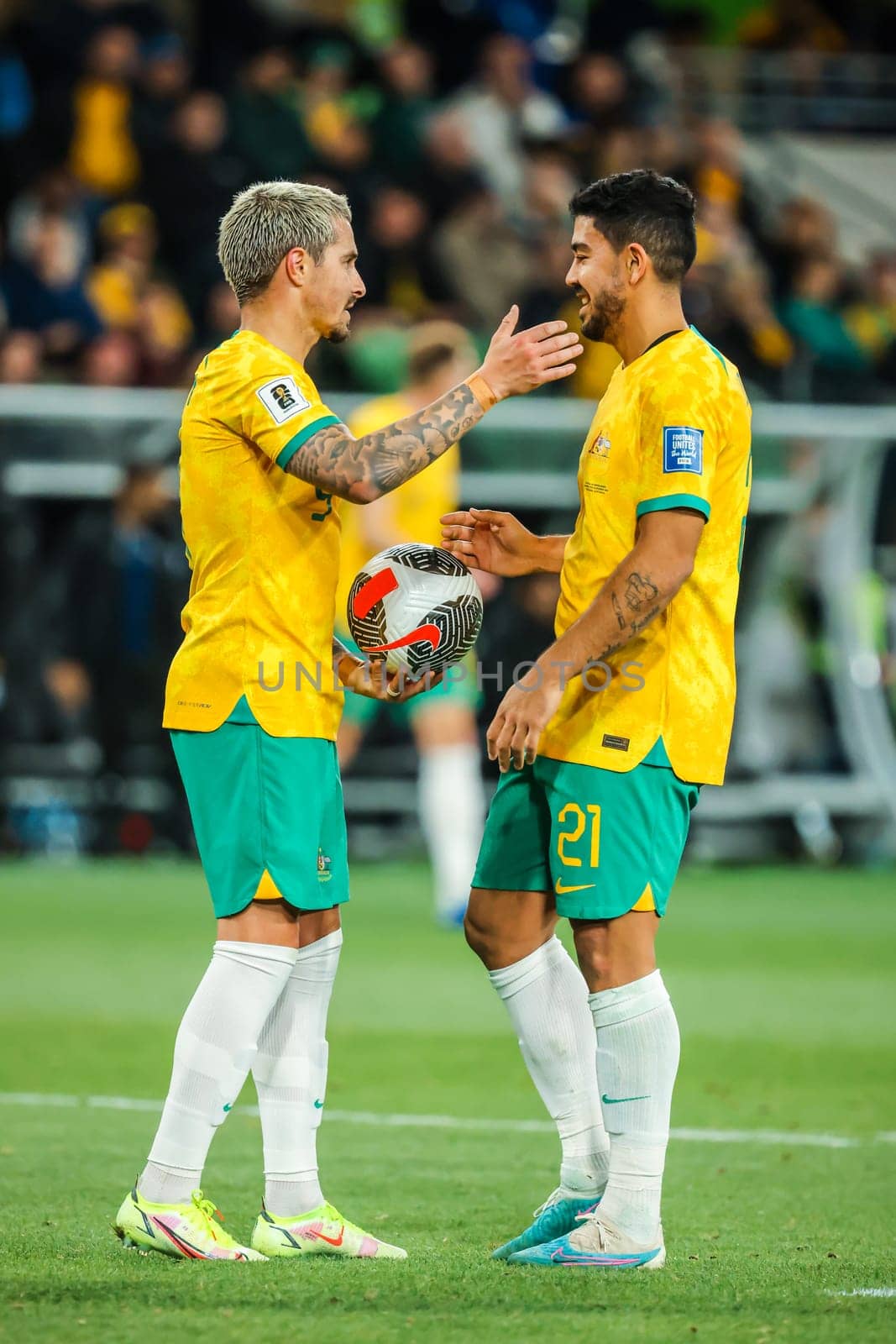 MELBOURNE, AUSTRALIA - NOVEMBER 16: Jamie Mclaren of Australia embraces Massimo Luongo of Australia during the 2026 FIFA World Cup Qualifier match between Australia Socceroos and Bangladesh at AAMI Park on November 16, 2023 in Melbourne, Australia