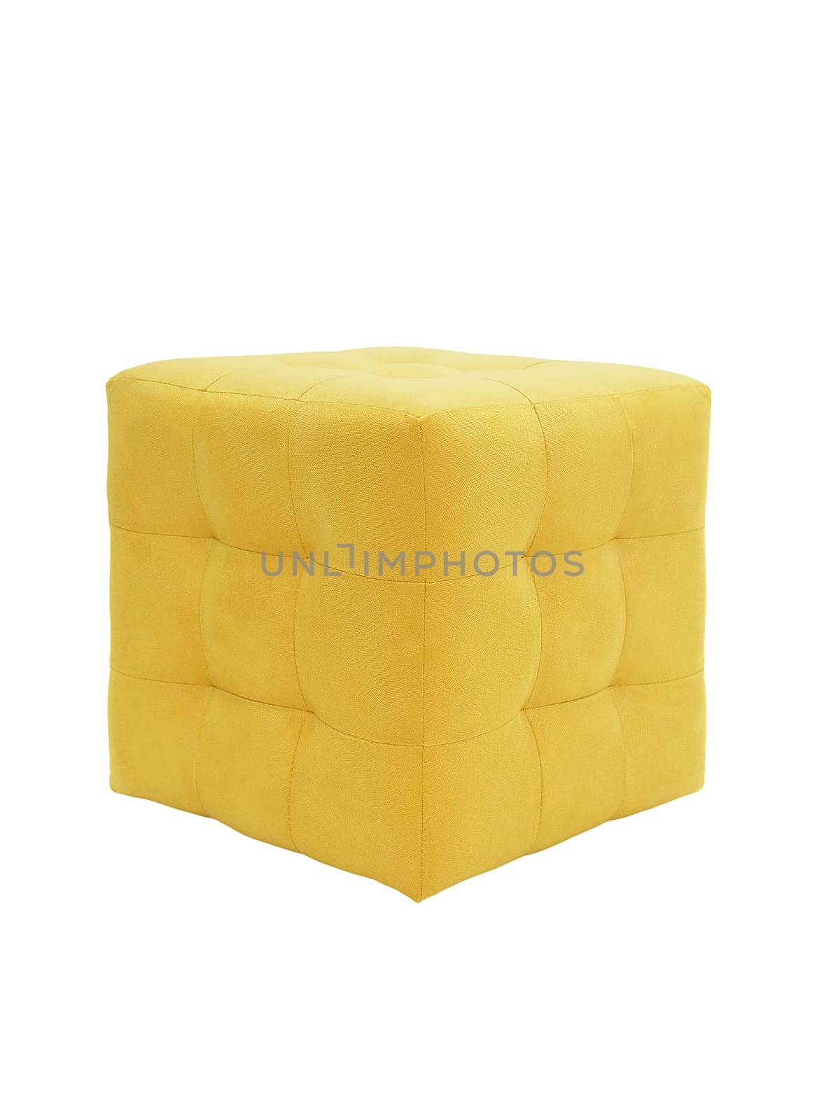 unusual modern yellow cubic padded stool upholstered with soft fabric in strict style isolated on white background. creative approach to making furniture in shape of geometric figures