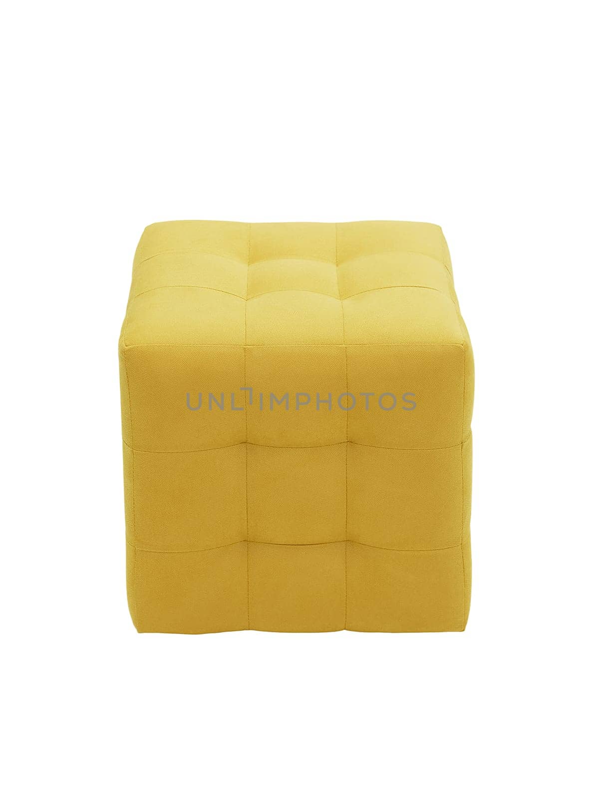 unusual modern yellow cubic padded stool upholstered with soft fabric in strict style isolated on white background. creative approach to making furniture in shape of geometric figures